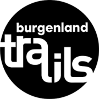 Das Bild zeigt einen dunklen Hintergrund mit einem hellen Objekt, das wie ein Smartphone aussieht, das einen weißen Bildschirm anzeigt.