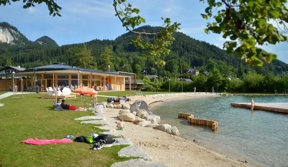 Nature, Outdoors, Scenery, Person, Lakefront, Building, Hotel, Resort, Bag, Handbag